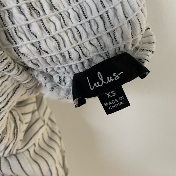 Elegant White Striped Jumpsuit - Picture 6 of 8